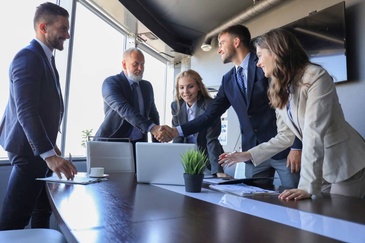 Business people shaking hands, finishing up a meeting